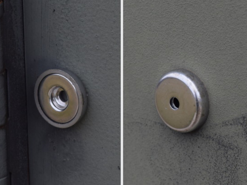 Stainless steel mounting magnet on a door outside
