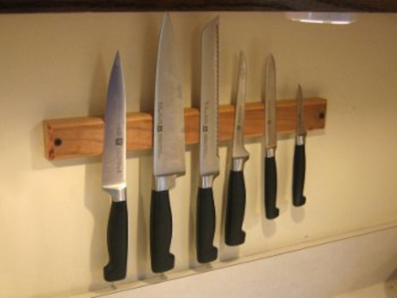 Magnets creating a cool and stylish way to organize kitchen knives