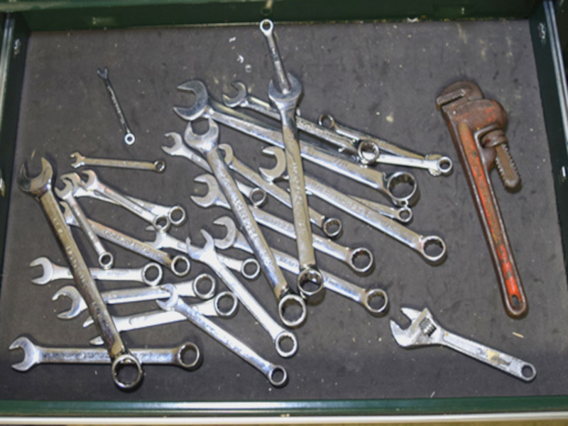 Tools messily scattered around in a toolbox