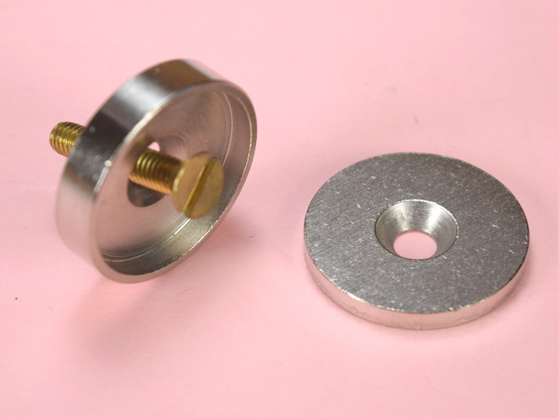 Assortment of steel cups and washers for hanging magnets