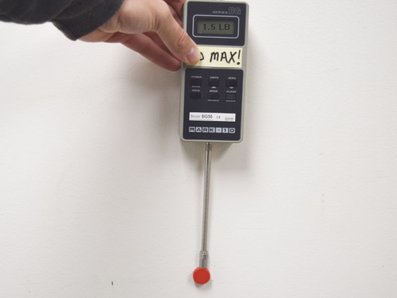 Testing plastic coated neodymium magnet pull force with force gauge