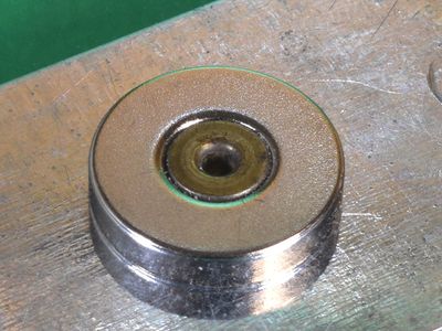 countersunk magnet screwed to metal