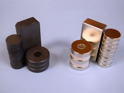 Stack of neodymium magnets and ceramic magnets for comparison