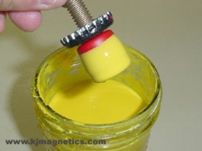 Coating a magnet in yellow rubber