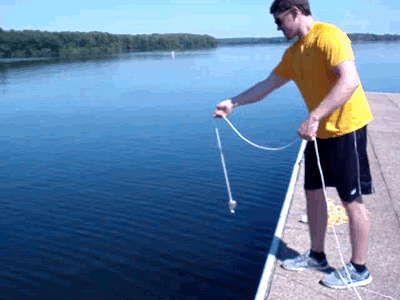 Tossing fishing magnet off dock to catch something cool