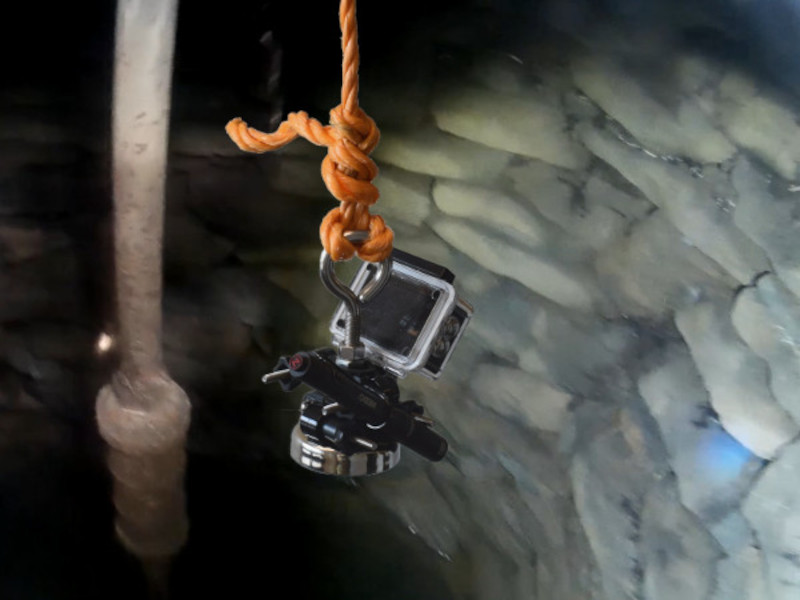 Treasure hunting in a well with a fishing magnet with light and camera attached
