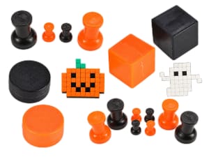 Colorful neodymium magnets making Halloween themed magnet art